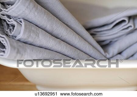 Stack of cloths in bowl View Large Photo Image Stock Image - Stack of cloths in bowl. Fotosearch