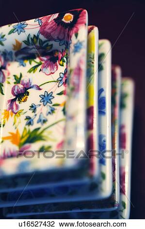 Stock Image - Stack of plates with floral pattern. Fotosearch