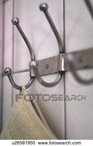 Stock Image - Stainless steel clothes hooks. Fotosearch