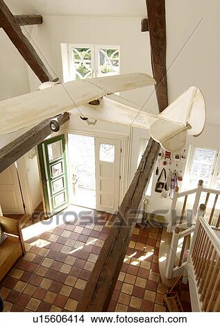 Picture - Staircase and floor with model airplane. Fotosearch