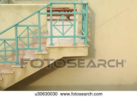 Stock Image - Stairs and terrace of a house. Fotosearch