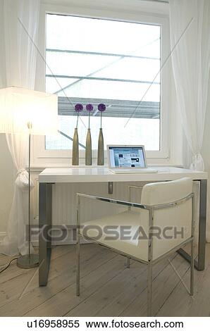 Standard lamp and desk with laptop at the window View Large Photo Image Stock Photography - Standard lamp and desk with laptop at the window. Fotosearch