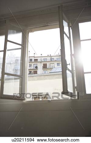 Sunbeam passing through open window View Large Photo Image Picture - Sunbeam passing through open window. Fotosearch