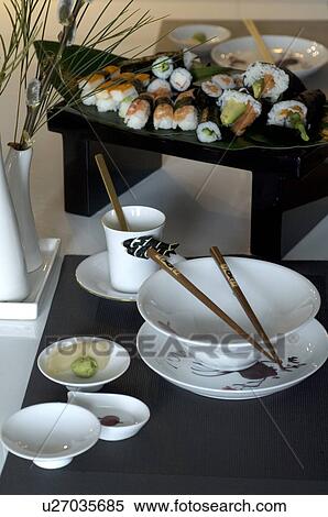 Sushi, chopsticks and bowls on table View Large Photo Image Stock Photography - Sushi, chopsticks and bowls on table. Fotosearch
