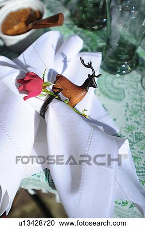Table decoration with deer figurine View Large Photo Image Stock Image - Table decoration with deer figurine. Fotosearch