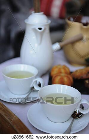 Tea set and pastry View Large Photo Image Stock Image - Tea set and pastry. Fotosearch
