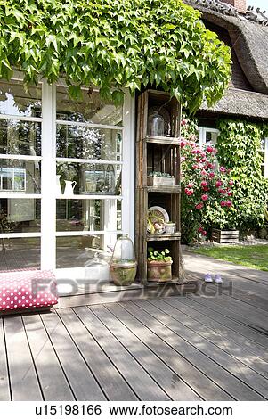 Stock Photograph - Terrace of a country house. Fotosearch