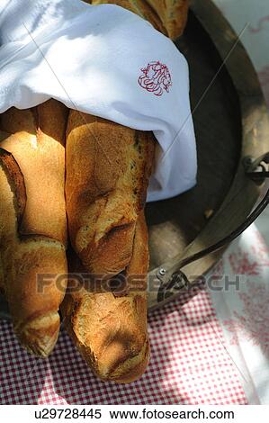 Three baguettes in wooden bowl View Large Photo Image Stock Photography - Three baguettes in wooden bowl. Fotosearch