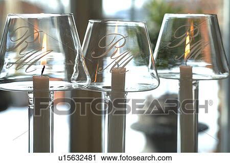 Three burning candles View Large Photo Image Stock Image - Three burning candles. Fotosearch