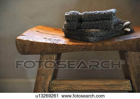 Towels on a stool View Large Photo Image Stock Image - Towels on a stool. Fotosearch
