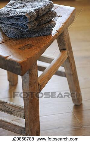 Towels on a stool View Large Photo Image Stock Photo - Towels on a stool. Fotosearch