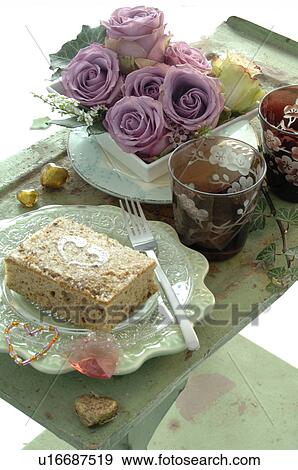 Tray with cake and small bunch of roses View Large Photo Image Stock Photo - Tray with cake and small bunch of roses. Fotosearch