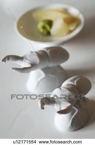 Two beetle figurines and bowl View Large Photo Image Picture - Two beetle figurines and bowl. Fotosearch