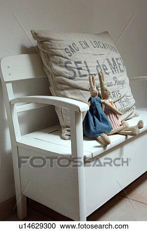 Two cuddly hares on bench View Large Photo Image Stock Image - Two cuddly hares on bench. Fotosearch