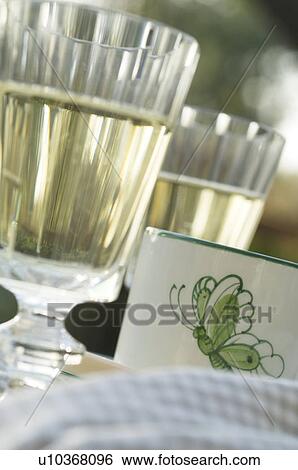 Two drinking glasses and cup View Large Photo Image Stock Photograph - Two drinking glasses and cup. Fotosearch