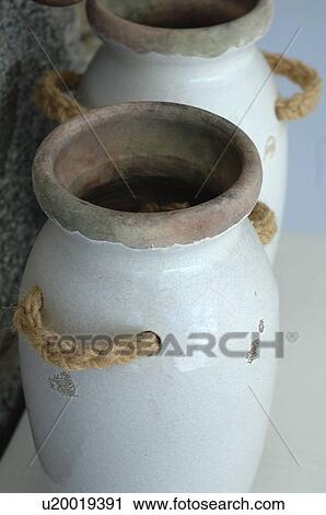Stock Image - Two earthenware jugs. Fotosearch
