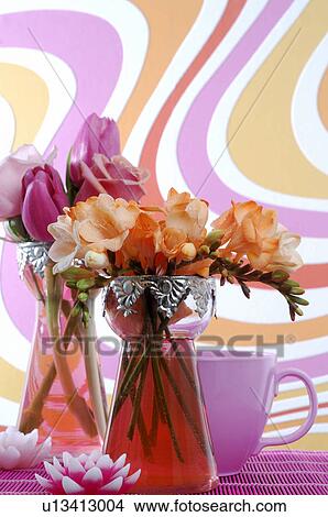 Picture - Two flower bouquets with roses, tulips and freesia. Fotosearch