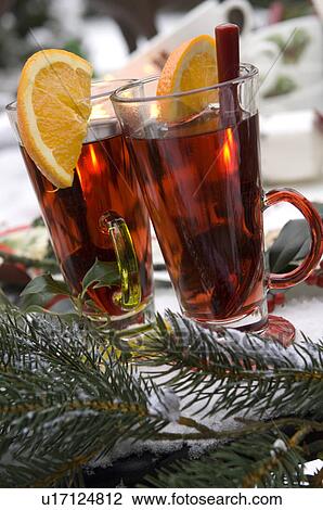 Two glasses with hot drinks and fir branches View Large Photo Image Stock Image - Two glasses with hot drinks and fir branches. Fotosearch