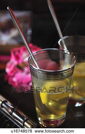 Two glasses with hot lemonade View Large Photo Image Stock Photo - Two glasses with hot lemonade. Fotosearch
