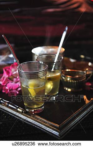 Two glasses with hot lemonade View Large Photo Image Stock Photograph - Two glasses with hot lemonade. Fotosearch