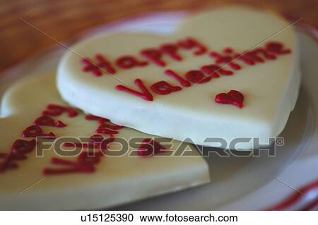 Two heart-shaped confectionaries for Valentines Day View Large Photo Image Stock Image - Two heart-shaped confectionaries for Valentines Day. Fotosearch
