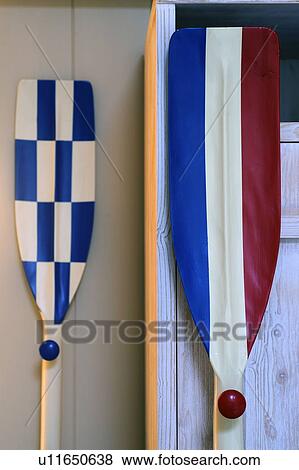 Stock Photo - Two oars leaning at wall. Fotosearch