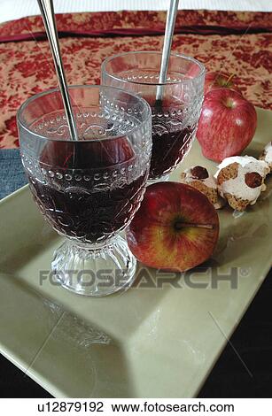 Two ornate glasses with apples and cookies View Large Photo Image Stock Image - Two ornate glasses with apples and cookies. Fotosearch