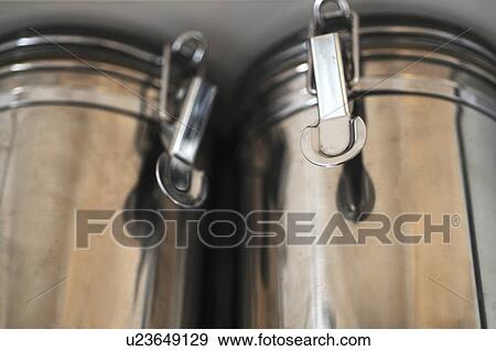 Two silver storage tins View Large Photo Image Stock Photo - Two silver storage tins. Fotosearch