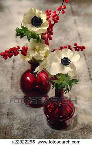 Stock Photography - Two vases with flowers and twigs. Fotosearch