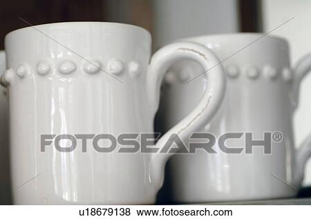 Stock Photo - Two white coffee mugs. Fotosearch