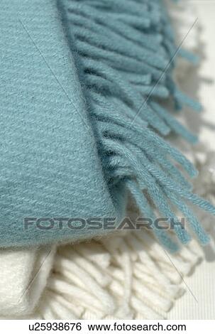 Stock Photograph - Two woolen blankets with fringes. Fotosearch