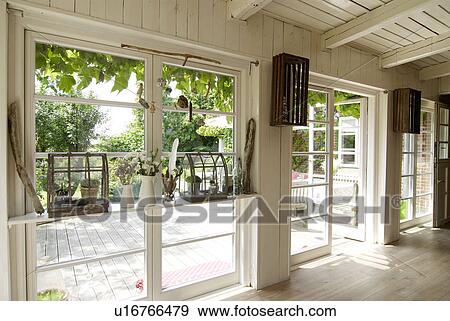 Stock Photo - View on the terrace of a country house. Fotosearch
