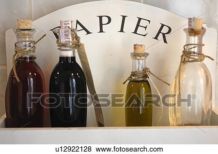 Vinegar and oil in glass bottles View Large Photo Image Stock Photo - Vinegar and oil in glass bottles. Fotosearch