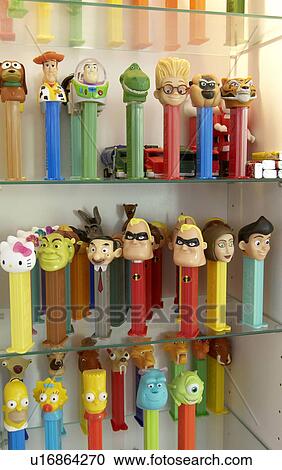 Stock Image - Vitrine with collection of figurines. Fotosearch