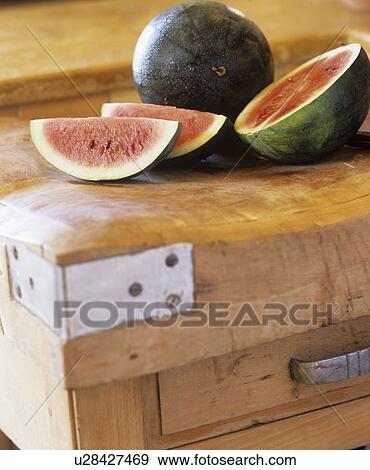Stock Photo - Water melon on wooden box. Fotosearch