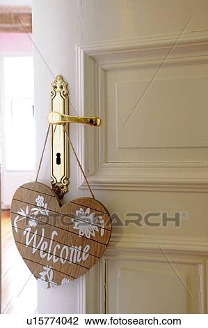 Welcome sign at door knob View Large Photo Image Stock Image - Welcome sign at door knob. Fotosearch