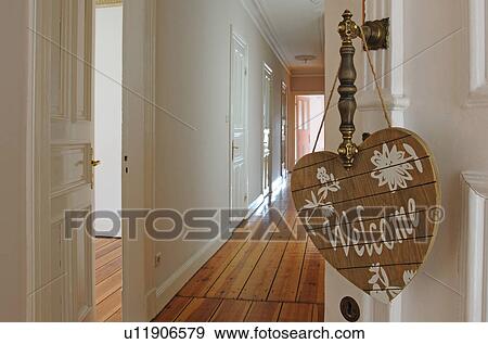 Welcome sign at door knob View Large Photo Image Stock Photo - Welcome sign at door knob. Fotosearch