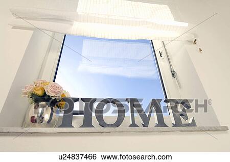 Stock Photograph - Window with writing home. Fotosearch