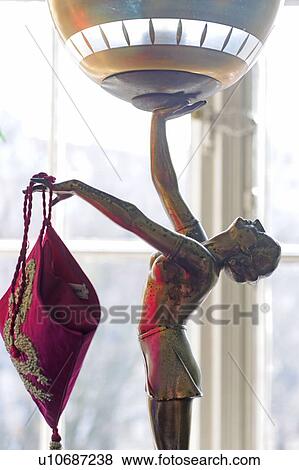 Womans figurine at the window View Large Photo Image Stock Photo - Womans figurine at the window. Fotosearch