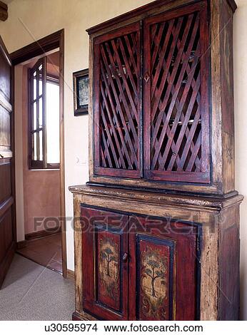 Wooden cabinet and open door View Large Photo Image Picture - Wooden cabinet and open door. Fotosearch
