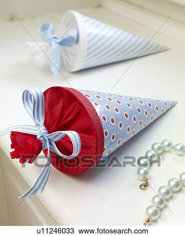 Stock Image - Wrapped gifts and jewelry. Fotosearch