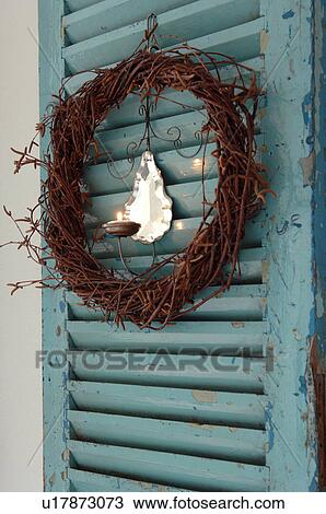 Wreath with candle at door View Large Photo Image Stock Image - Wreath with candle at door. Fotosearch