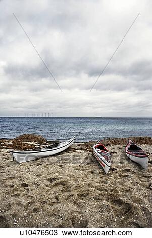 3 kayaks on beach View Large Photo Image Stock Image - 3 kayaks on beach. Fotosearch