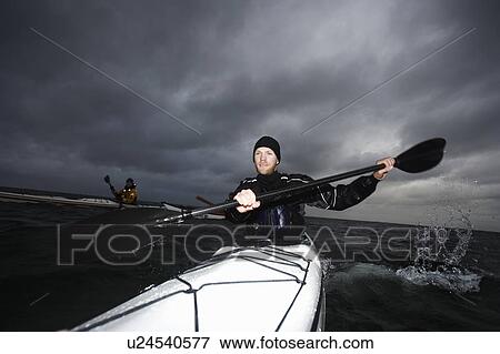 3 kaykers at see View Large Photo Image Stock Photo - 3 kaykers at see. Fotosearch