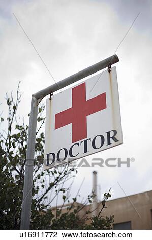 A Doctor sign with Red Cross View Large Photo Image Stock Image - A Doctor sign with Red Cross. Fotosearch