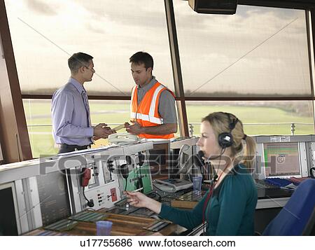 Air traffic controllers in tower View Large Photo Image Stock Photograph - Air traffic controllers in tower. Fotosearch