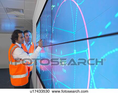 Air traffic controllers with simulation View Large Photo Image Stock Image - Air traffic controllers with simulation. Fotosearch