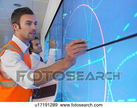 Air traffic controllers with simulation View Large Photo Image Stock Photo - Air traffic controllers with simulation. Fotosearch
