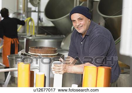 Artisan bison mozzarella production View Large Photo Image Stock Photo - Artisan bison mozzarella production. Fotosearch