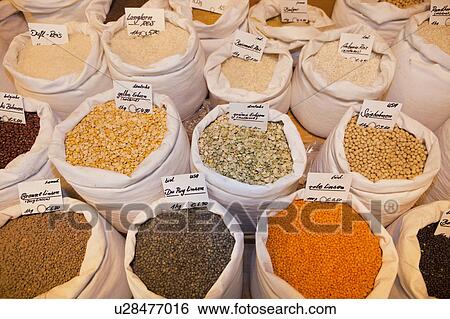 Stock Photograph - Bags with various herbs, peas and lens. Fotosearch